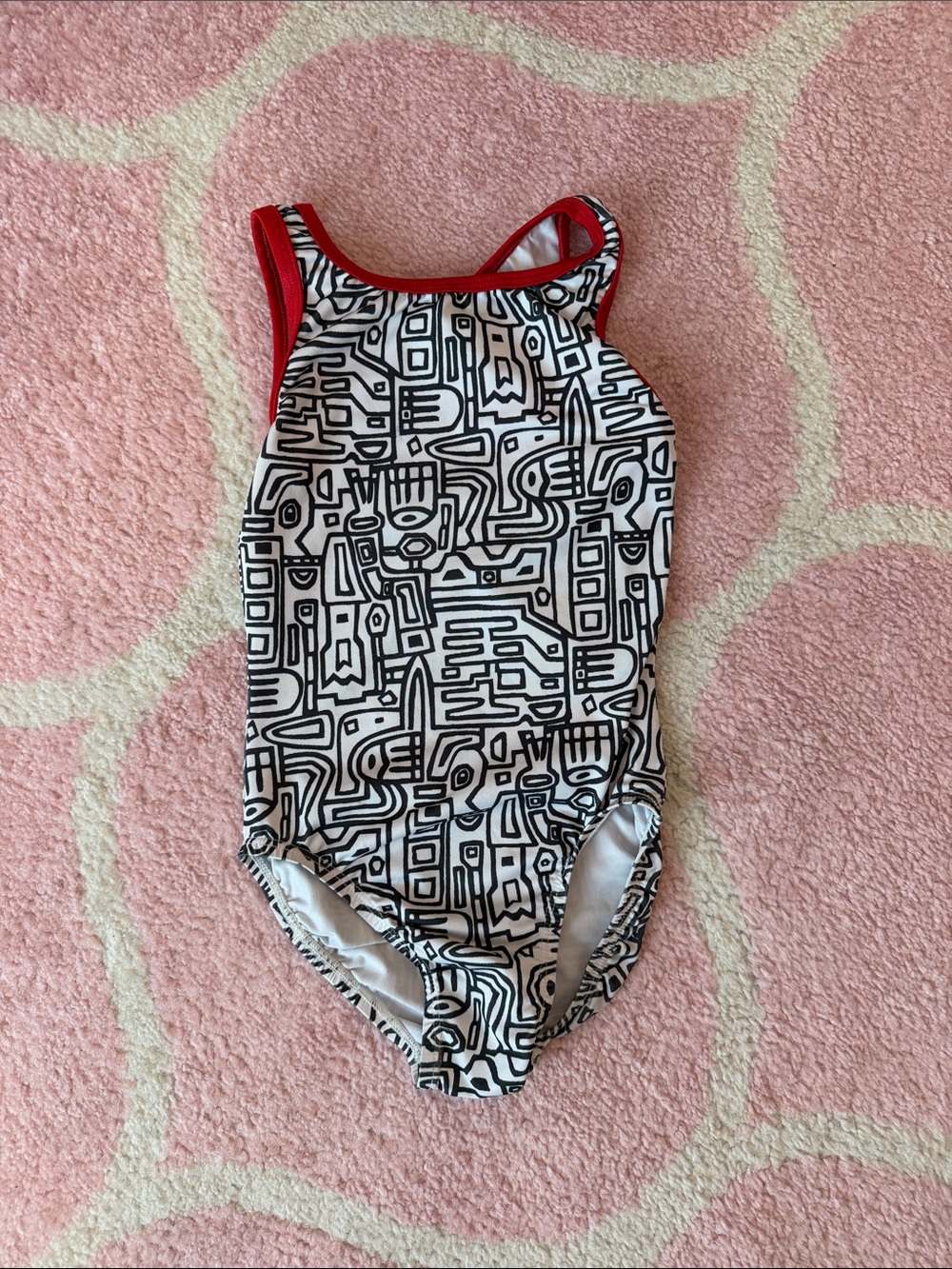 Girls Black & White Geo Print gymnastics leotard with Red Trim child large